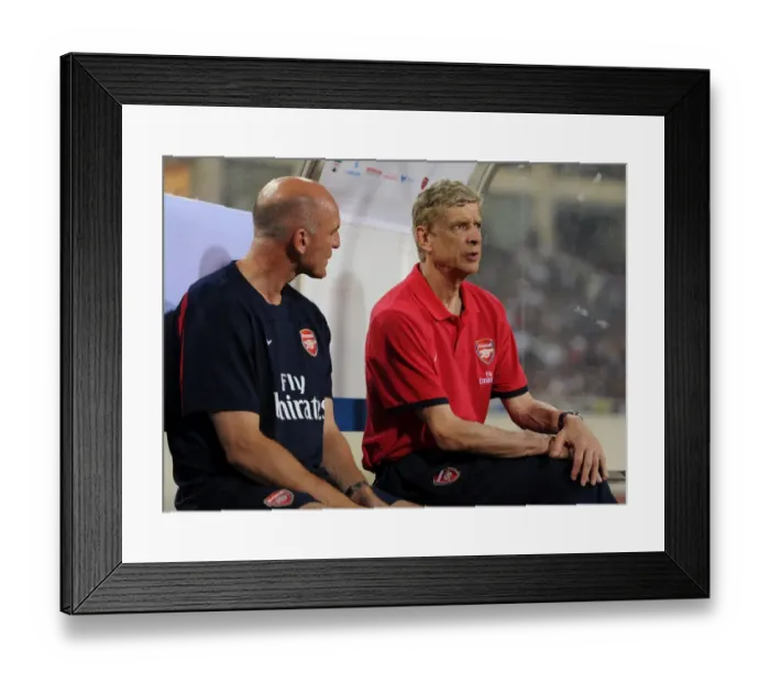 Framed Print : Arsenal Managers Wenger and Bould Pre-Match in Vietnam (2013) Framed Print : Arsenal Managers Wenger and Bould Pre-Match in Vietnam (2013)