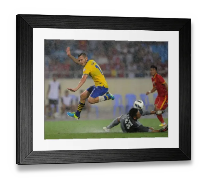 Framed Print : Jack Wilshere vs. Tran Buu Ngoc: A Talent-Filled Clash in the Vietnam vs. Arsenal Friendly, 2013 Framed Print : Jack Wilshere vs. Tran Buu Ngoc: A Talent-Filled Clash in the Vietnam vs. Arsenal Friendly, 2013