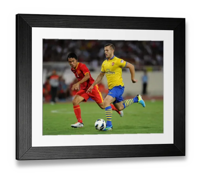 Framed Print : Clash of Talents: Jack Wilshere vs Pham Nguyen Sa - Arsenal vs Vietnam, 2013 Framed Print : Clash of Talents: Jack Wilshere vs Pham Nguyen Sa - Arsenal vs Vietnam, 2013