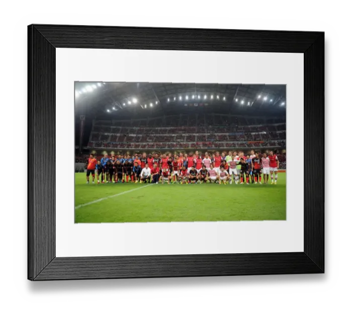 Framed Print : The Arsenal and Nagoya players at the end of the match. Nagoya Grampus 1: 3 Arsenal