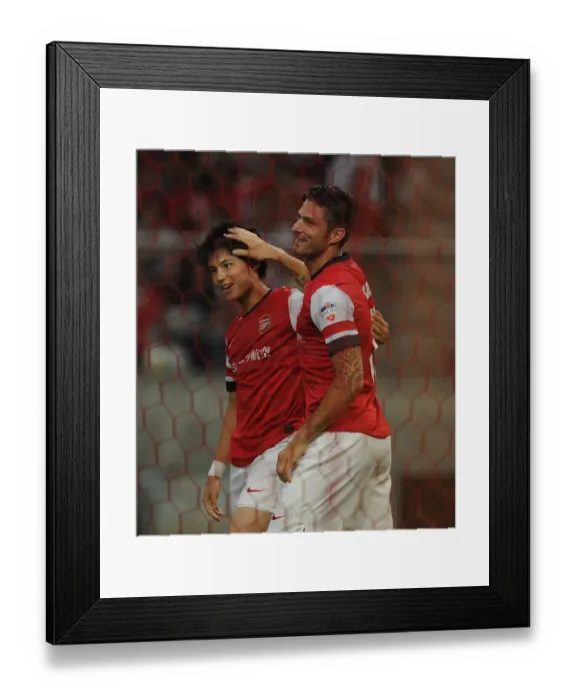 Framed Print : Giroud and Miyaichi Celebrate First Goal for Arsenal in Nagoya Grampus Match, 2013