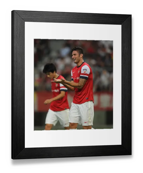 Framed Print : Olivier Giroud Scores First Goal for Arsenal in 2013 Nagoya Grampus Match