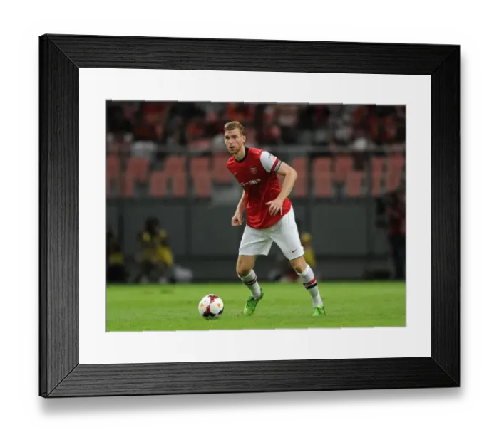 Framed Print : TOYOTA, JAPAN - JULY 22: Per Mertesacker of Arsenal FC during the pre-season Asian Tour friendly match between Nagoya Framed Print : TOYOTA, JAPAN - JULY 22: Per Mertesacker of Arsenal FC during the pre-season Asian Tour friendly match between Nagoya