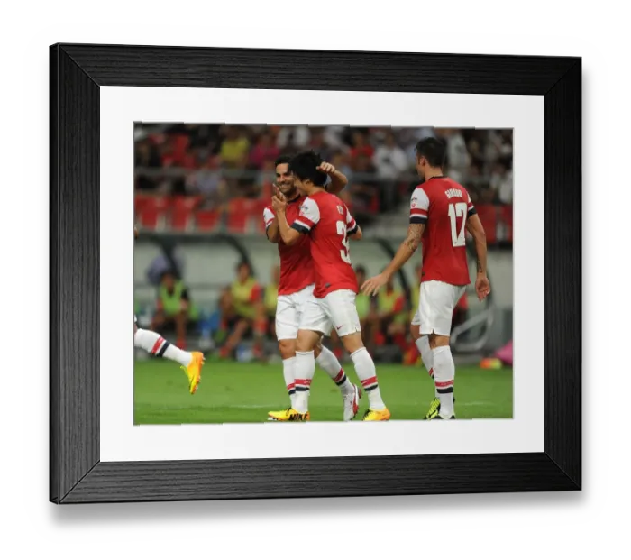 Framed Print : Arsenal's Miyaichi, Arteta, and Giroud Celebrate Goals Against Nagoya Grampus in 2013