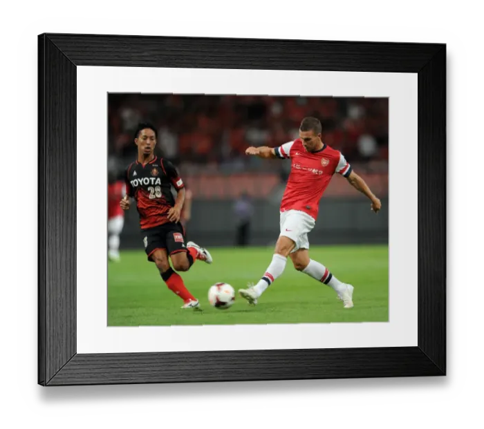 Framed Print : Lukas Podolski vs. Taishi Taguchi: Nagoya Grampus vs. Arsenal, 2013