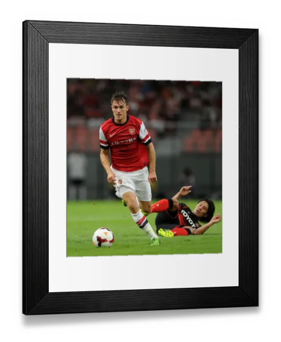 Framed Print : Aaron Ramsey Outmaneuvers Jungo Fujimoto: Nagoya Grampus vs. Arsenal (2013) Framed Print : Aaron Ramsey Outmaneuvers Jungo Fujimoto: Nagoya Grampus vs. Arsenal (2013)