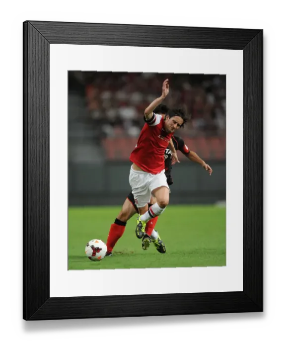 Framed Print : Arsenal's Rosicky Fouls by Nakamura in Nagoya Grampus vs Arsenal Clash (2013)