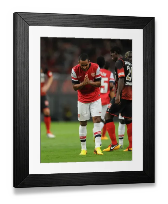Framed Print : Theo Walcott's Thrilling Goal: Arsenal's Victory over Nagoya Grampus in the 2013 Toyota Tour