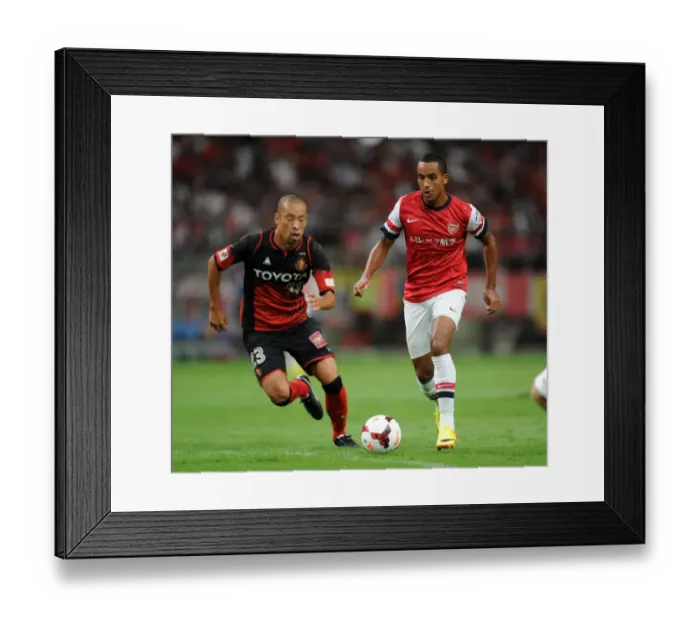 Framed Print : Theo Walcott vs. Yosuke Ishibitsu: Nagoya Grampus vs. Arsenal, 2013