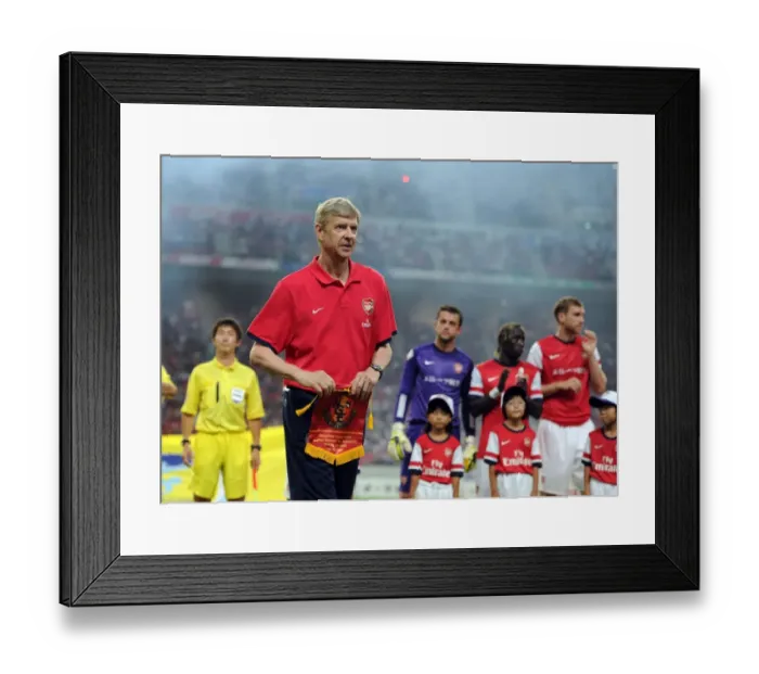 Framed Print : Arsene Wenger with Nagoya Grampus Pennant before Arsenal's 2013 Pre-season Match