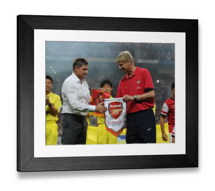 Framed Print : Arsene Wenger and Dragan Stojkovic Exchange Pennants during Nagoya Grampus vs. Arsenal Match, 2013 Framed Print : Arsene Wenger and Dragan Stojkovic Exchange Pennants during Nagoya Grampus vs. Arsenal Match, 2013