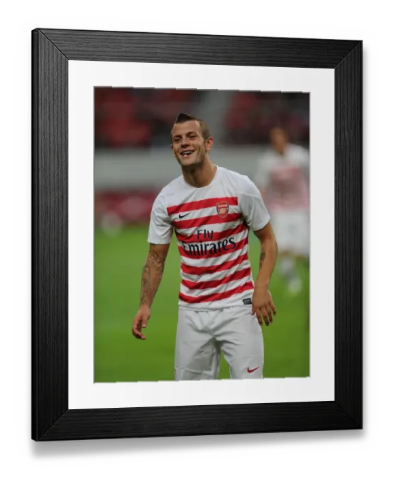 Framed Print : Jack Wilshere Gears Up for Nagoya Grampus Clash: Arsenal FC's Pre-Season Training in Japan, 2013