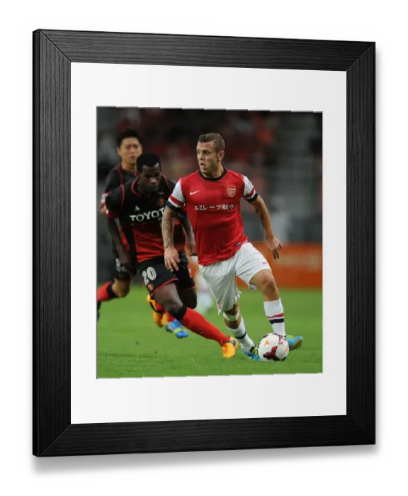 Framed Print : Jack Wilshere vs Danilson: Nagoya Grampus vs Arsenal, 2013