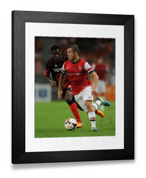 Framed Print : Clash of Talents: Jack Wilshere vs Danilson, Arsenal vs Nagoya Grampus (2013)