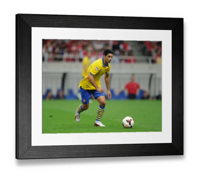 Framed Print : Mikel Arteta Leads Arsenal in Pre-Season Match against Urawa Red Diamonds (2013) Framed Print : Mikel Arteta Leads Arsenal in Pre-Season Match against Urawa Red Diamonds (2013)