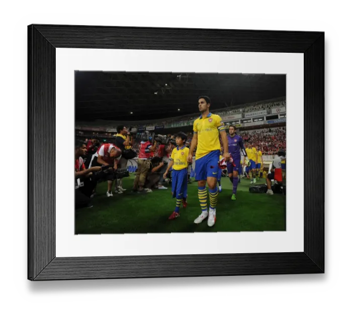 Framed Print : Mikel Arteta (Arsenal) leads out the team. Uwara Red Diamonds 1: 2 Arsenal. Pre Season Friendly Framed Print : Mikel Arteta (Arsenal) leads out the team. Uwara Red Diamonds 1: 2 Arsenal. Pre Season Friendly