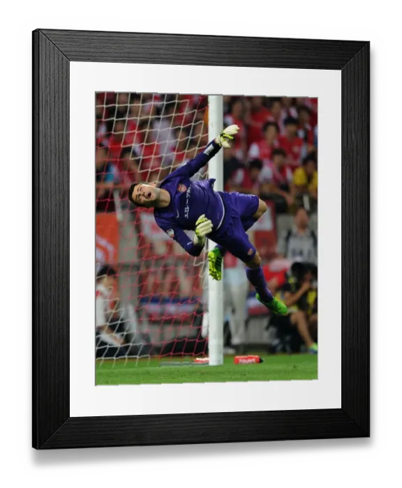 Framed Print : Arsenal's Lukas Fabianski in Action Against Urawa Red Diamonds, Japan 2013