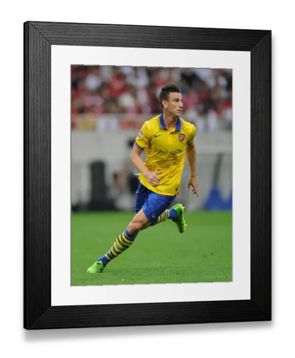 Framed Print : Laurent Koscielny in Action: Arsenal vs Urawa Red Diamonds, Japan 2013 Framed Print : Laurent Koscielny in Action: Arsenal vs Urawa Red Diamonds, Japan 2013