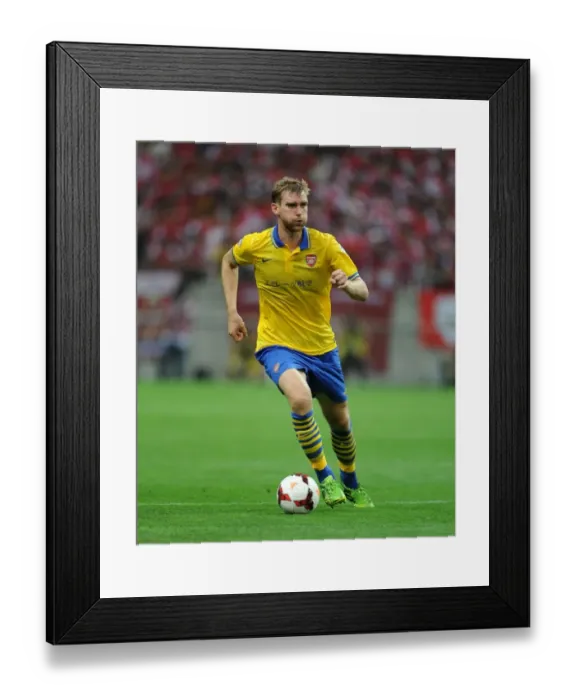 Framed Print : Per Mertesacker in Action: Arsenal vs Urawa Red Diamonds, Japan 2013