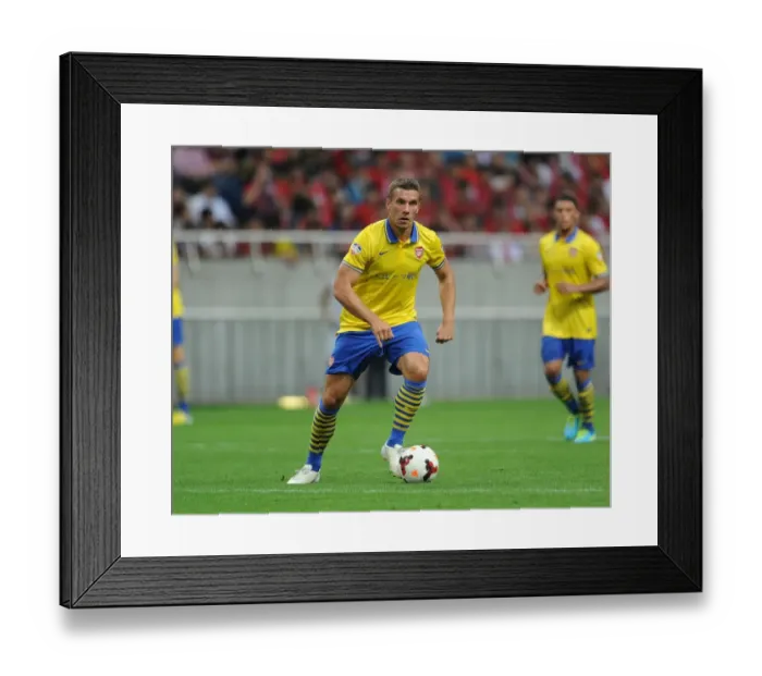 Framed Print : Lukas Podolski Faces Urawa Red Diamonds in Arsenal's 2013 Pre-Season Clash Framed Print : Lukas Podolski Faces Urawa Red Diamonds in Arsenal's 2013 Pre-Season Clash