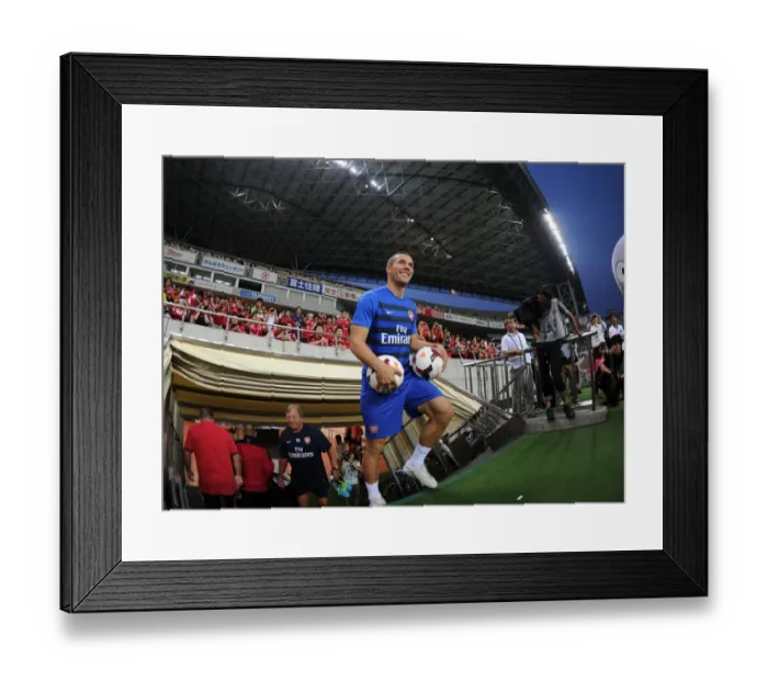 Framed Print : Lukas Podolski: Arsenal's Readiness in Action - Urawa Red Diamonds 2013-14 Pre-Season Friendly
