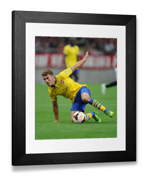 Framed Print : Aaron Ramsey in Action: Arsenal vs Urawa Red Diamonds, Japan 2013