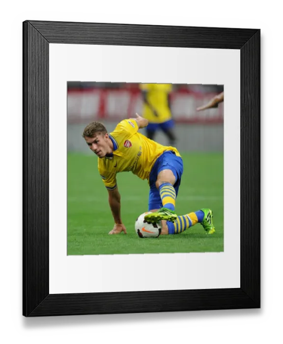 Framed Print : Aaron Ramsey in Action: Arsenal vs Urawa Red Diamonds, Japan 2013 Framed Print : Aaron Ramsey in Action: Arsenal vs Urawa Red Diamonds, Japan 2013