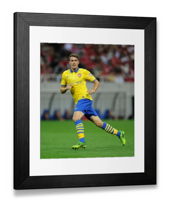 Framed Print : Arsenal's Aaron Ramsey in Action against Urawa Red Diamonds, Japan 2013 Framed Print : Arsenal's Aaron Ramsey in Action against Urawa Red Diamonds, Japan 2013