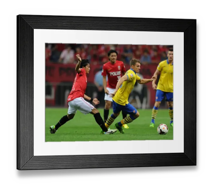 Framed Print : Arsenal's Aaron Ramsey Outruns Urawa Red Diamonds Shuto Kojima Framed Print : Arsenal's Aaron Ramsey Outruns Urawa Red Diamonds Shuto Kojima