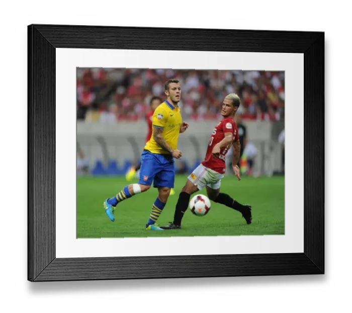 Framed Print : Jack Wilshere vs. Marcio Richardes: Clash in the Far East - Urawa Red Diamonds vs. Arsenal (2013) Framed Print : Jack Wilshere vs. Marcio Richardes: Clash in the Far East - Urawa Red Diamonds vs. Arsenal (2013)