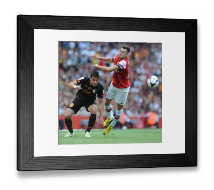 Framed Print : Arsenal's Jenkinson Faces Off Against Riera as Galatasaray Takes Emirates Cup Lead