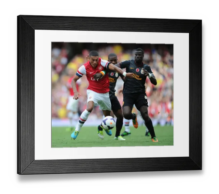 Framed Print : Clash at the Emirates: Oxlade-Chamberlain vs. Eboue