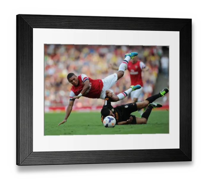 Framed Print : Arsenal's Alex Oxlade-Chamberlain Fouled by Galatasaray's Ceyhun Gulselam - Emirates Cup 2013 Framed Print : Arsenal's Alex Oxlade-Chamberlain Fouled by Galatasaray's Ceyhun Gulselam - Emirates Cup 2013