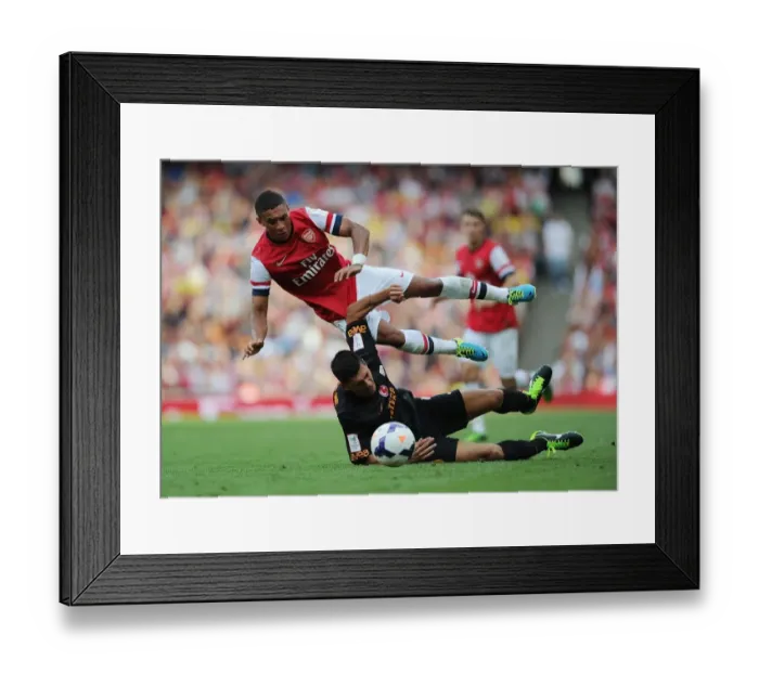 Framed Print : Arsenal's Alex Oxlade-Chamberlain Fouls by Galatasaray's Ceyhun Gulselam - Emirates Cup 2013 Framed Print : Arsenal's Alex Oxlade-Chamberlain Fouls by Galatasaray's Ceyhun Gulselam - Emirates Cup 2013