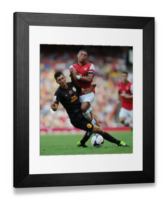 Framed Print : Arsenal's Oxlade-Chamberlain Fouls by Galatasaray's Gulselam - Emirates Cup 2013 Framed Print : Arsenal's Oxlade-Chamberlain Fouls by Galatasaray's Gulselam - Emirates Cup 2013