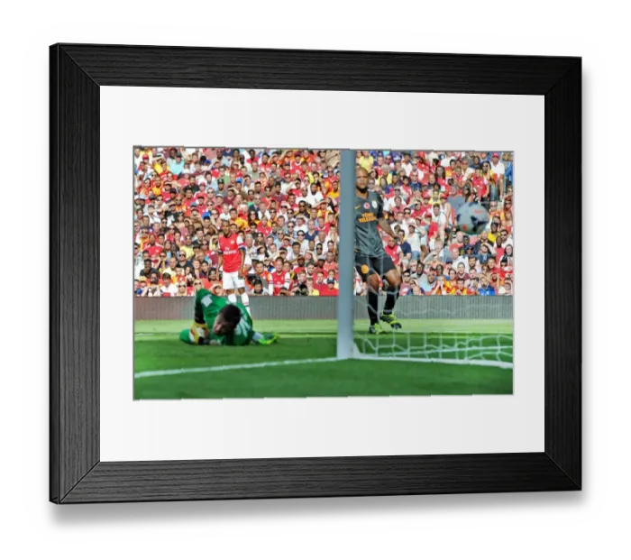 Framed Print : Theo Walcott watches his cross go in for Arsenals goal. Arsenal 1: 2 Galatasaray Framed Print : Theo Walcott watches his cross go in for Arsenals goal. Arsenal 1: 2 Galatasaray