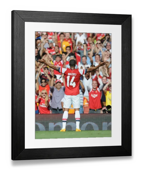 Framed Print : Theo Walcott celebrates scoring Arsenals goal. Arsenal 1: 2 Galatasaray. Emirates Cup Day Two