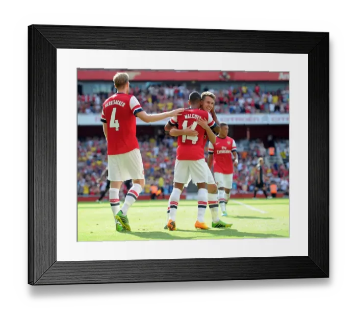 Framed Print : Arsenal's Theo Walcott, Per Mertesacker, and Aaron Ramsey Celebrate Goal Against Galatasaray (2013-14)