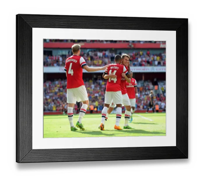 Framed Print : Arsenal Triumph: Walcott, Mertesacker, Ramsey - Celebrating a Goal against Galatasaray (2013-14) Framed Print : Arsenal Triumph: Walcott, Mertesacker, Ramsey - Celebrating a Goal against Galatasaray (2013-14)