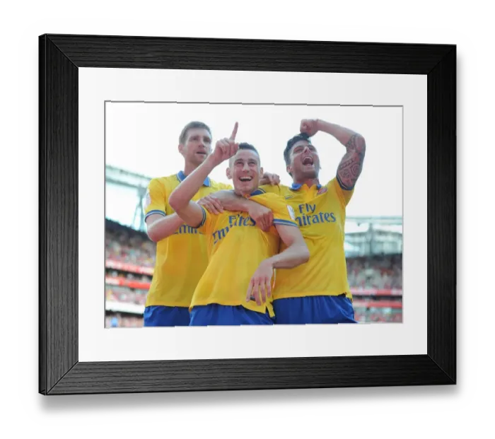 Framed Print : Arsenal's Unstoppable Trio: Koscielny, Mertesacker, and Giroud's Unforgettable Goal Celebration (2013-14 Emirates Cup)