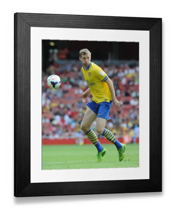 Framed Print : Per Mertesacker (Arsenal). Arsenal 2: 2 Napoli. Emirates Cup Day One. Emirates Stadium, 3  /  8  /  13