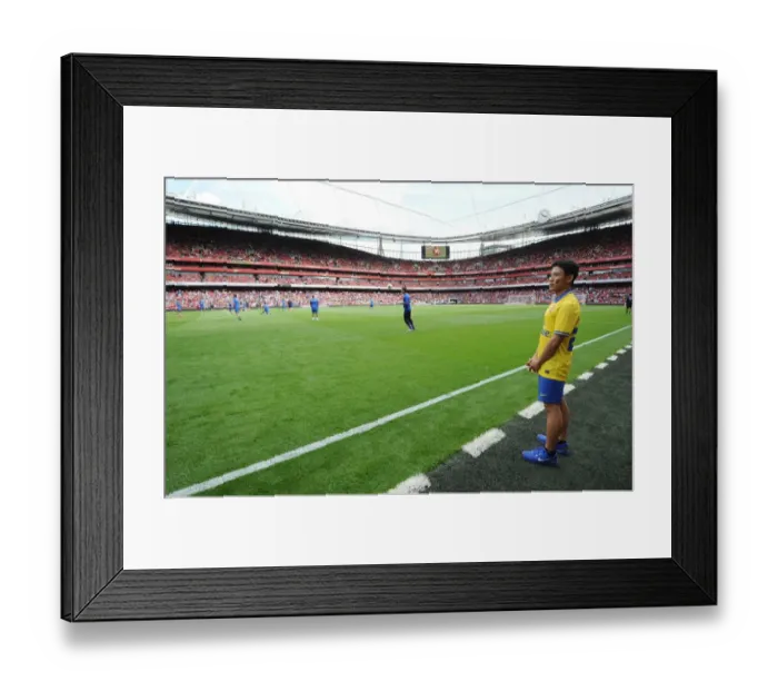 Framed Print : The Running Man: Arsenal vs. Napoli - Emirates Cup 2013