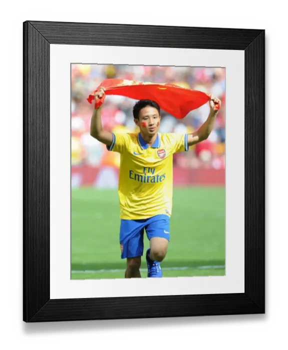 Framed Print : The Running Man: Arsenal vs. Napoli - Emirates Cup 2013