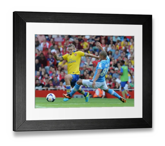 Framed Print : Arsenal's Jack Wilshere Fends Off Napoli's Gokhan Inler in 2013-14 Emirates Cup Clash