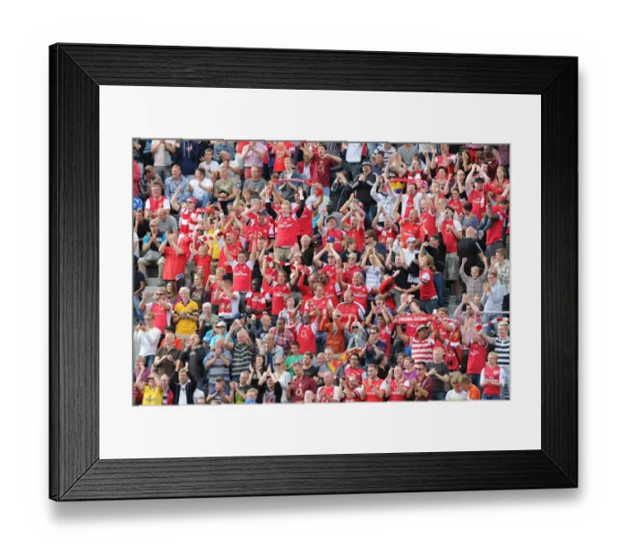 Framed Print : Arsenal Fans in Full Force: Arsenal vs Manchester City Pre-Season Clash in Helsinki, Finland (2013)