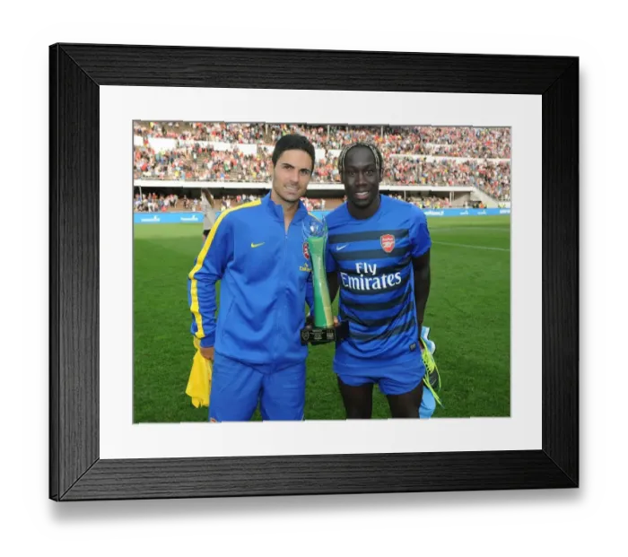 Framed Print : Arsenal's Mikel Arteta and Bacary Sagna: Post-Match Reunion Against Manchester City (2013) Framed Print : Arsenal's Mikel Arteta and Bacary Sagna: Post-Match Reunion Against Manchester City (2013)
