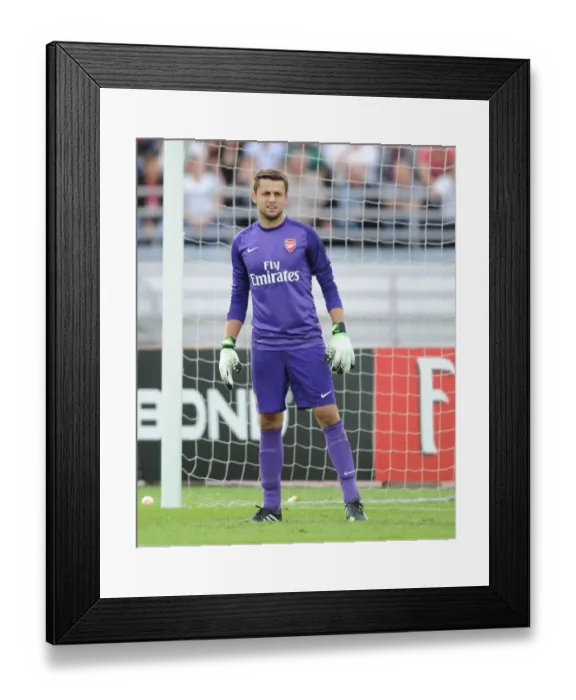 Framed Print : Arsenal's Lukasz Fabianski Faces Manchester City in Pre-Season Showdown (2013, Finland) Framed Print : Arsenal's Lukasz Fabianski Faces Manchester City in Pre-Season Showdown (2013, Finland)