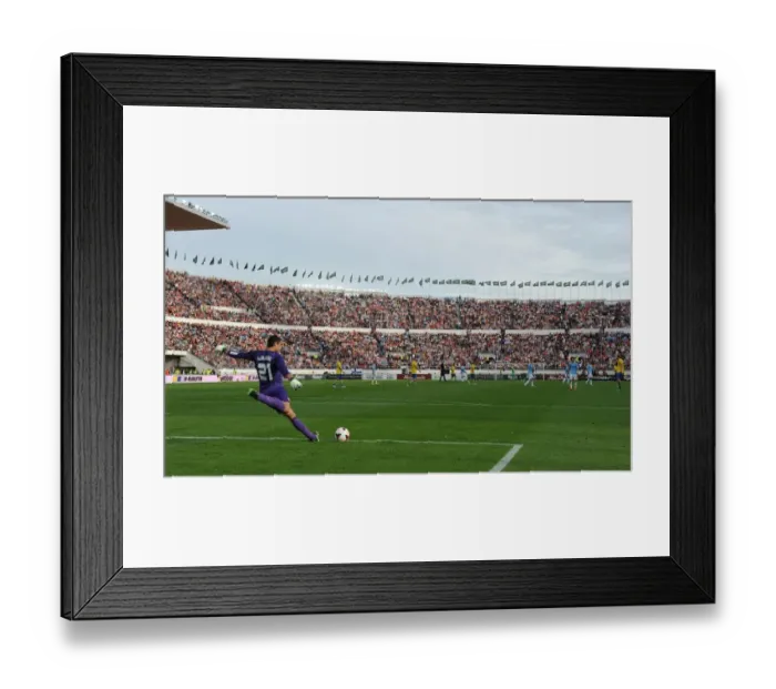 Framed Print : Arsenal's Lukasz Fabianski Kicks Off at Olympic Stadium: Arsenal vs Manchester City Pre-Season 2013-14