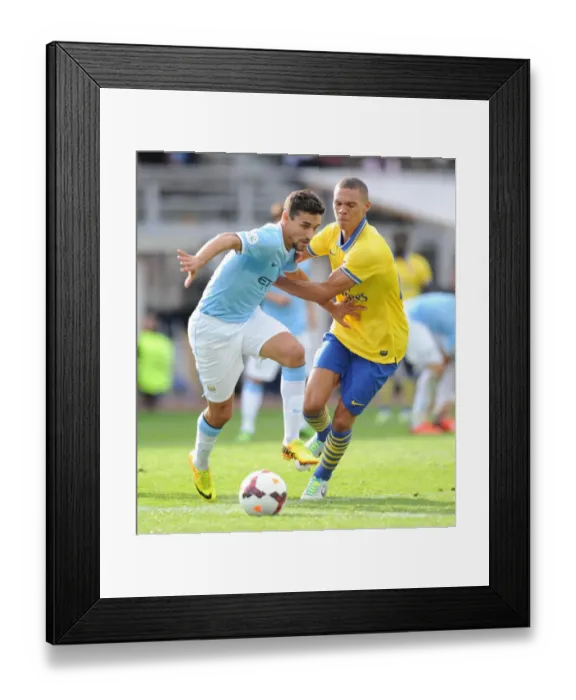 Framed Print : Arsenal vs Manchester City: Kieran Gibbs vs Jesus Navas in Pre-Season Clash, 2013