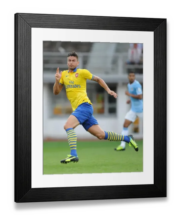 Framed Print : Arsenal's Olivier Giroud Faces Manchester City in Pre-Season Friendly, 2013 Framed Print : Arsenal's Olivier Giroud Faces Manchester City in Pre-Season Friendly, 2013